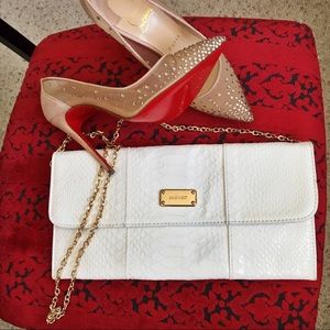 White snake embossed clutch